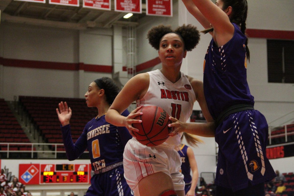 Brianne Alexander gets in on the action in APSU's clash with Tennessee Tech on Thursday, Feb. 15. VALARIE LINERAS | THE ALL STATE 