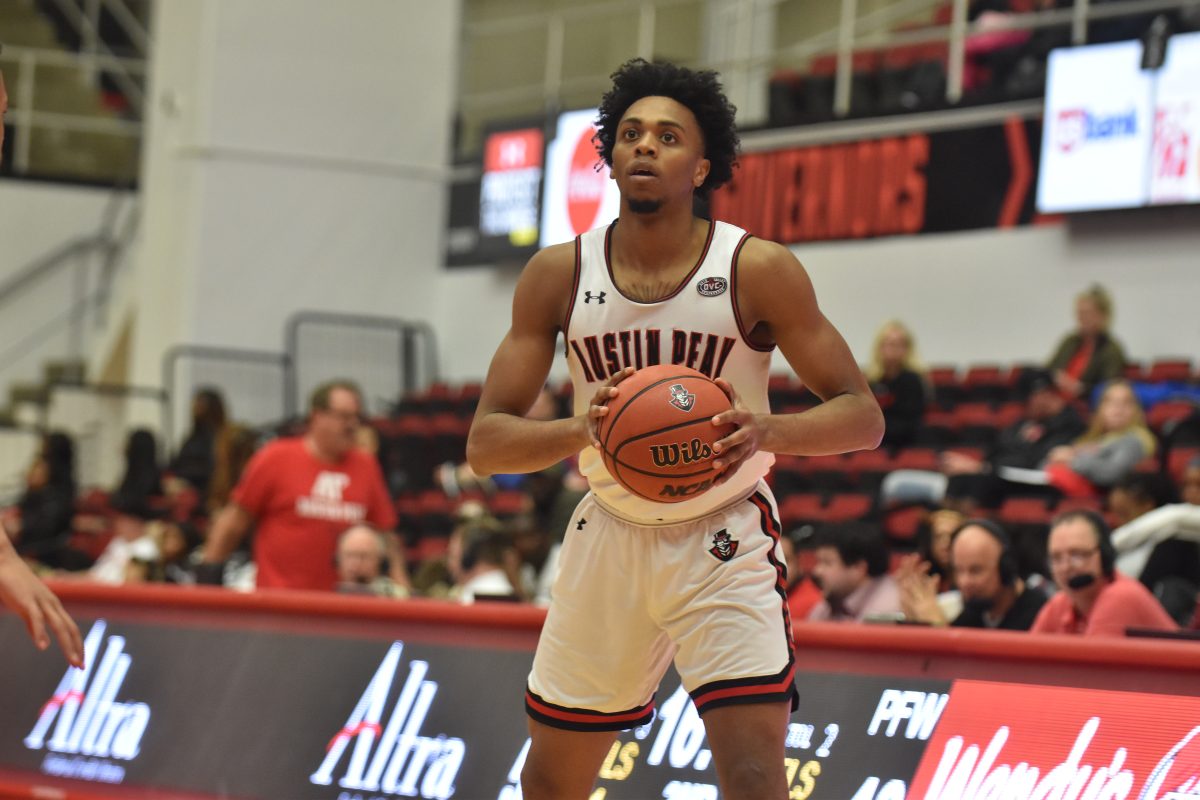 Steve Harris moves the ball in APSU's  95-68 thrashing of Fort Wayne on Saturday, Dec. 15. STAFF PHOTOGRAPHER | THE ALL STATE