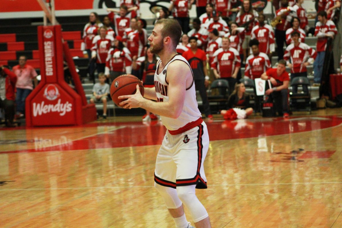 Zach Glotta holds the ball in the Govs late escape against UT Martin on Senior Day on Saturday, Feb. 23. BRIANNA ELLIOT | THE ALL STATE