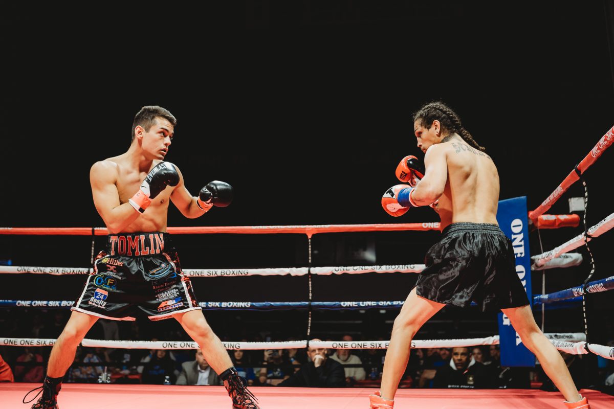 Tyler "Short Fuse" Tomlin remains undefeated after he knocks out Charlie Serrano in the second round at the Dunn Center. JENNIFER LINDAHL | THE ALL STATE
