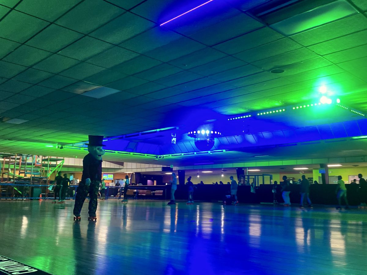 The Governor joins the students on the skating rink at Magic Wheels Fun Center on Wednesday night.