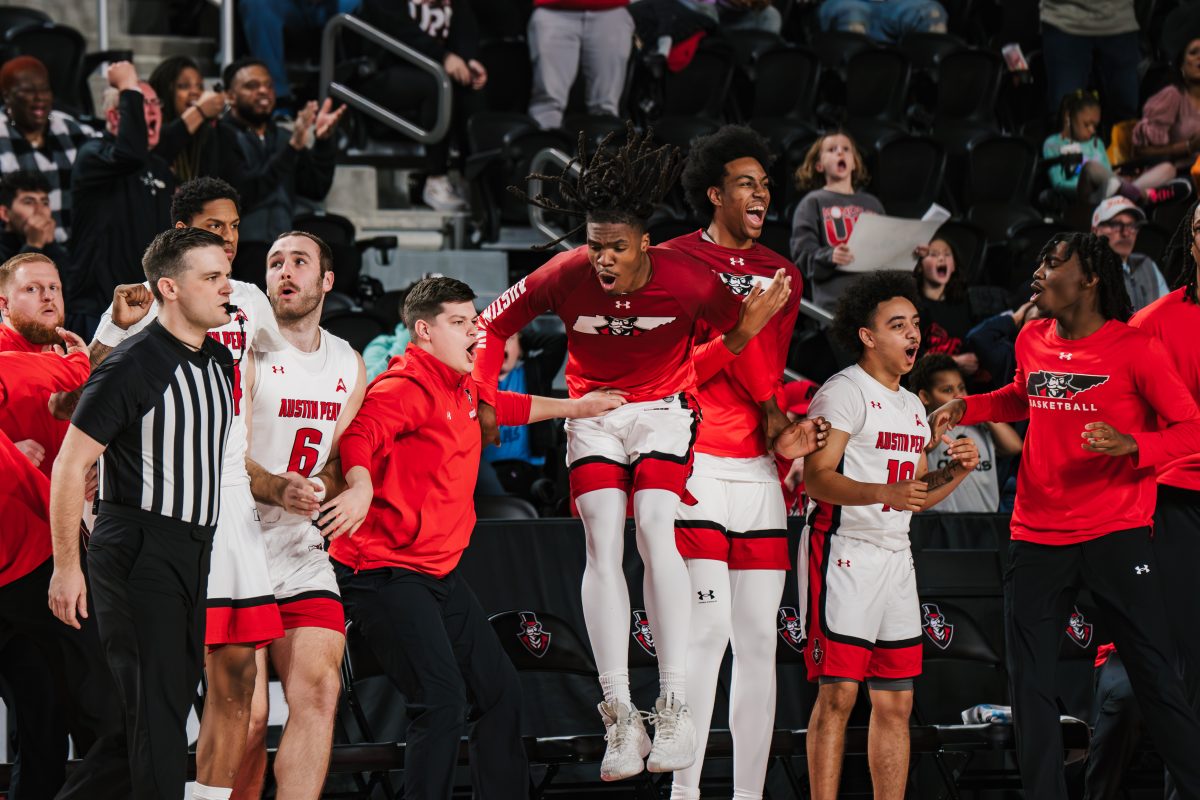 The Austin Peay State University men's basketball team celebrated a 90-87 overtime victory against the Bellarmine Knights on Friday. Jennifer Lindahl| The All State