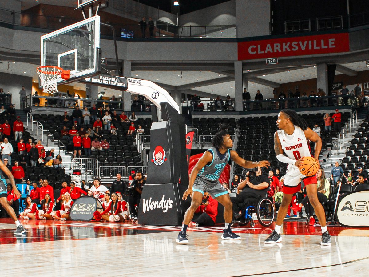 Austin Peay State University graduate student, DeMarcus Sharp, looks to make a drive to the goal in the last seconds of the game against North Florida. APSU hosted North Florida in the ASUN Quarterfinal game at F&amp;M Bank Arean on March 5, 2024. Making history with the first 100-point game in the arena with a score of 101-98, APSU will host North Alabama in the semifinal game on Thursday, March 7, 2024, at 7 p.m CARLEE KLUTTS| The All State