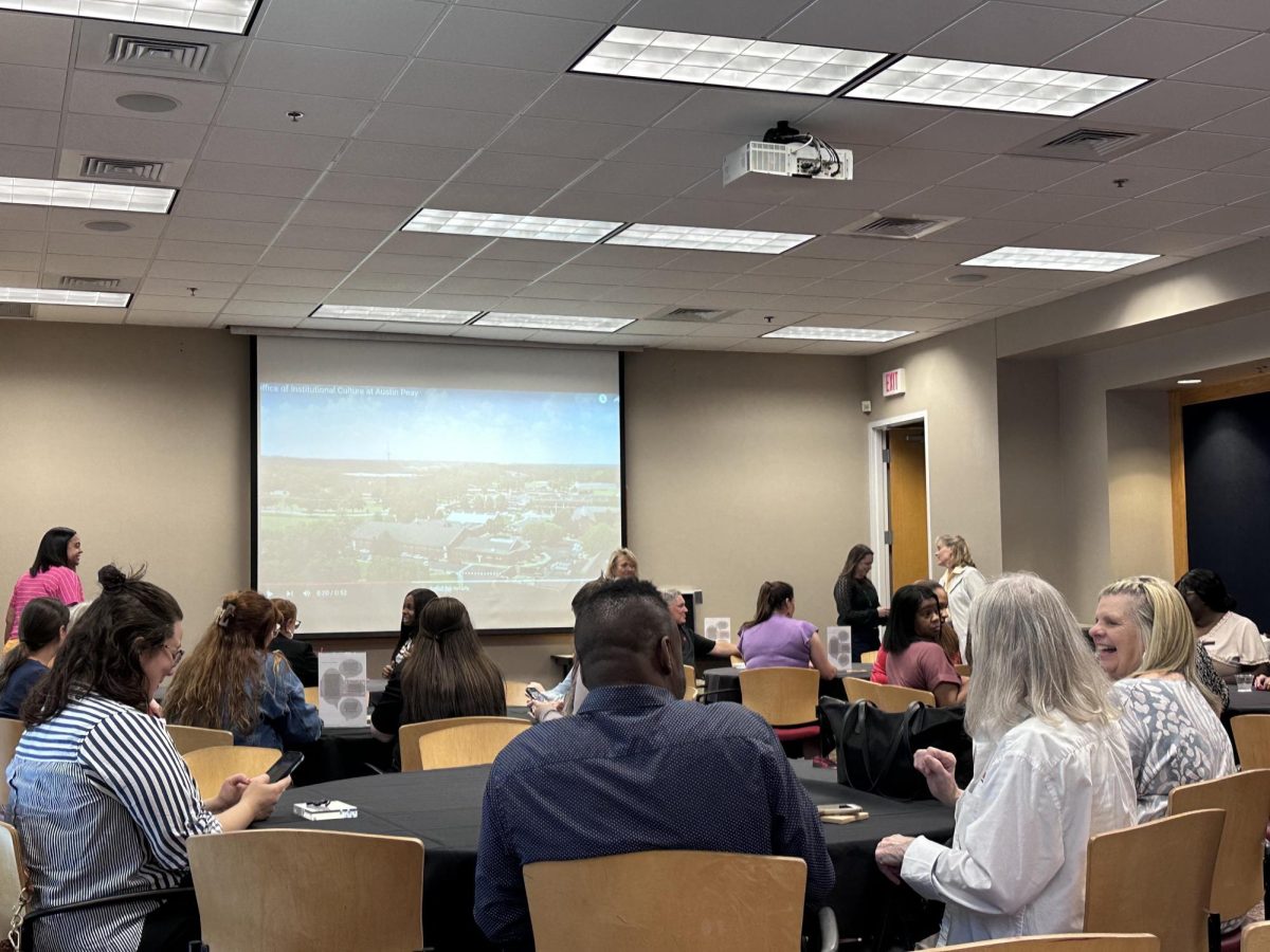 Faculty and staff chat after the Appreciation and Belonging Hour Event held in the Morgan University Center on Thursday, Sept. 26.