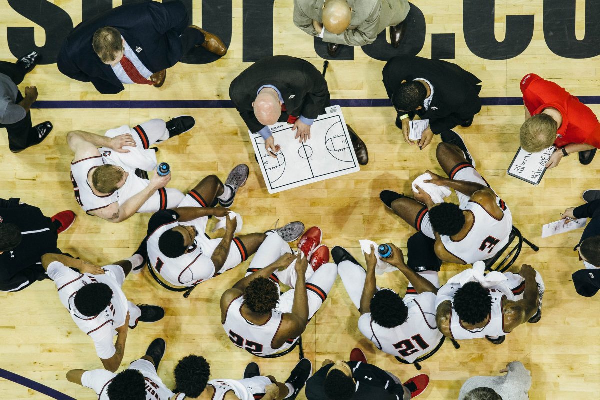 Head Coach Matt Figger talks his team back into their quarterfinal tilt with Eastern Illinois early in the second half. BENJAMIN LITTLE | THE ALL STATE