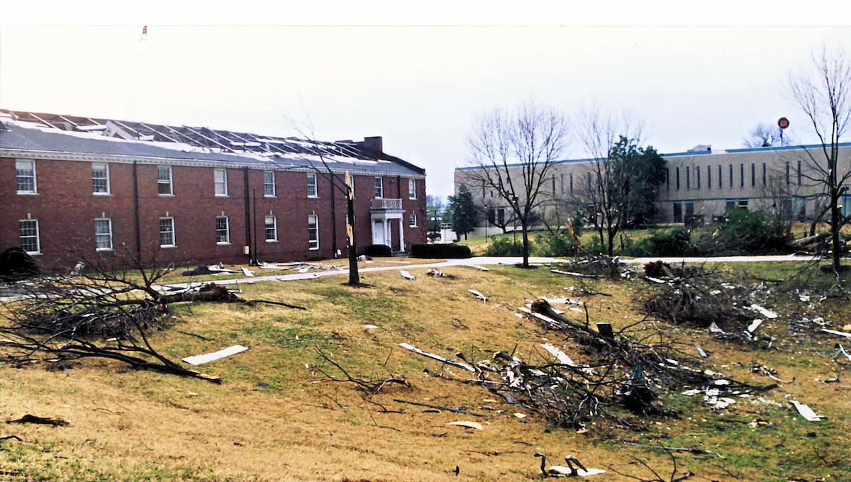 Archival photos taken soon after the severely damaging F3 tornado struck downtown Clarksville TN on January 22, 1999. Austin Peay State University sustained heavy damage to landscaping, trees, and many buildings across the campus.

The west side of Harvill Hall on the left side of the photo shows that nearly the whole roof is missing. Ahead is Woodward library.