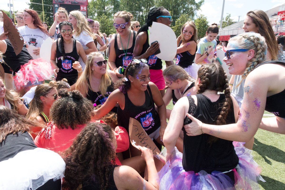 Members of Sigma Kappa celebrate and share laughs on Panhellenic Sorority Bid Day 2018. JOANN MORALES | THE ALL STATE