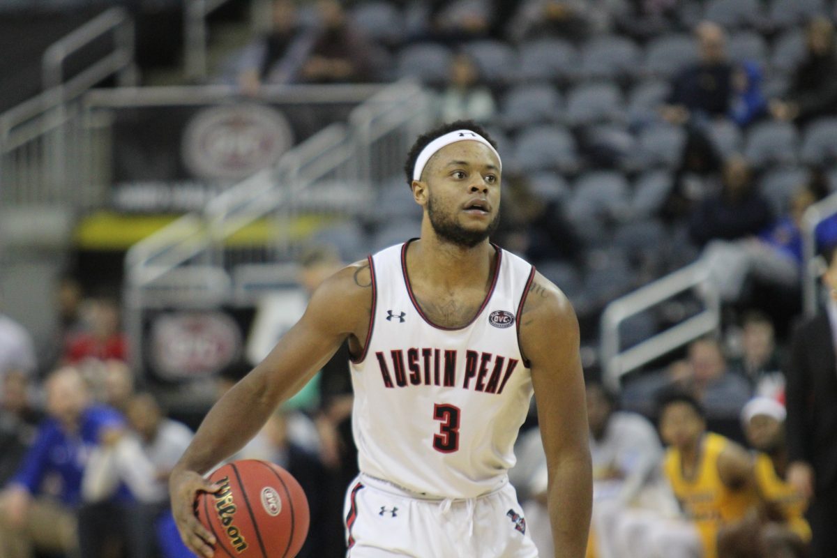 Chris Porter-Bunton reads the court in APSU's 95-81 Ohio Valley Conference Quarterfinal win over Morehead State. TREY CHRYSTAK | THE ALL STATE