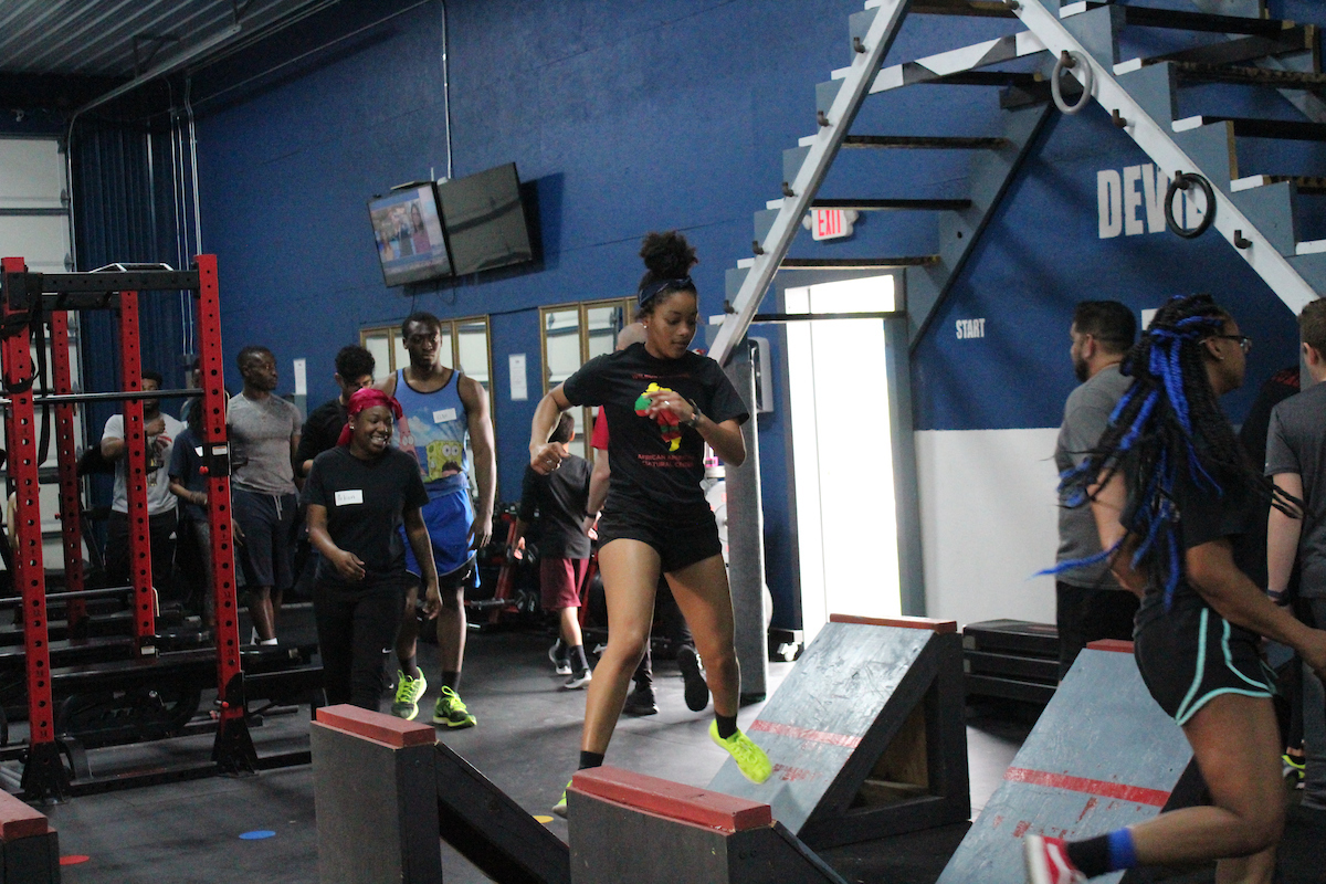 A participant works out on the obstacles in Total Obstacle Fitness Center's American Ninja Warrior Night on Friday, April 12.
ZOE BYFORD | THE ALL STATE