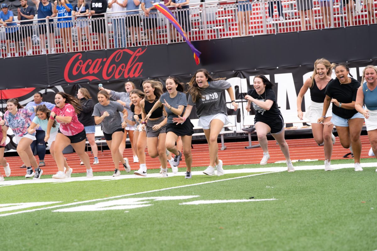 PNMs run home to their new sorority chapters on Bid Day at Fortera Stadium on September 5, 2022. JENNIFER LINDAHL| THE ALL STATE