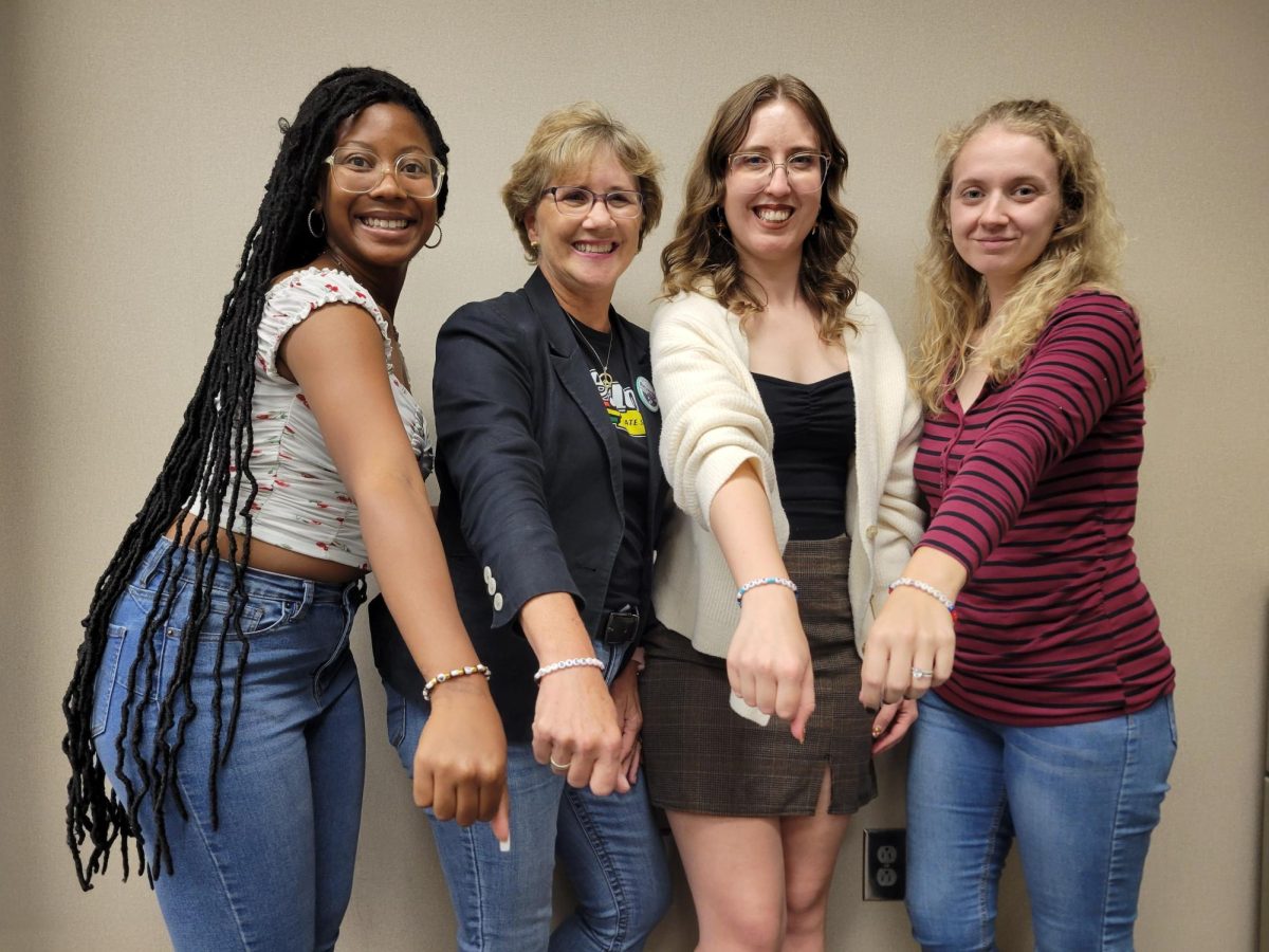 Toniah Anderson, Karen Reynolds, Jessica Johnson and Allie Phillips posed with their bracelets for a change. 