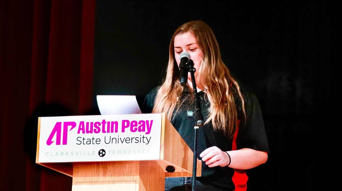 Alli Johnson, president of Austin Peay State University's Govs Programming Council, a student organization, opens the floor at their town hall meeting Wednesday night.