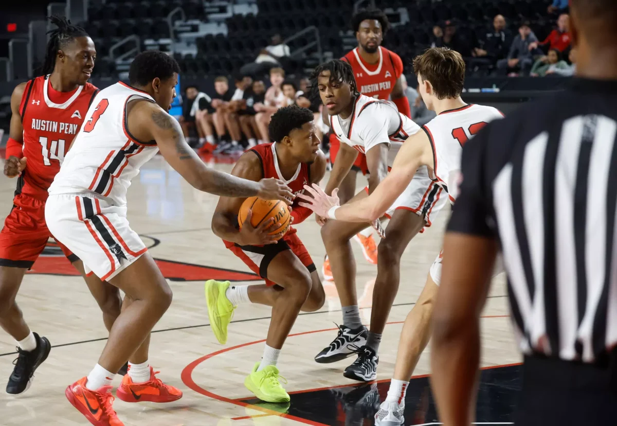 Austin Peay State University guard LJ Thomas going up for a contested layup in the 95-75 win against Union University in the season opener. 