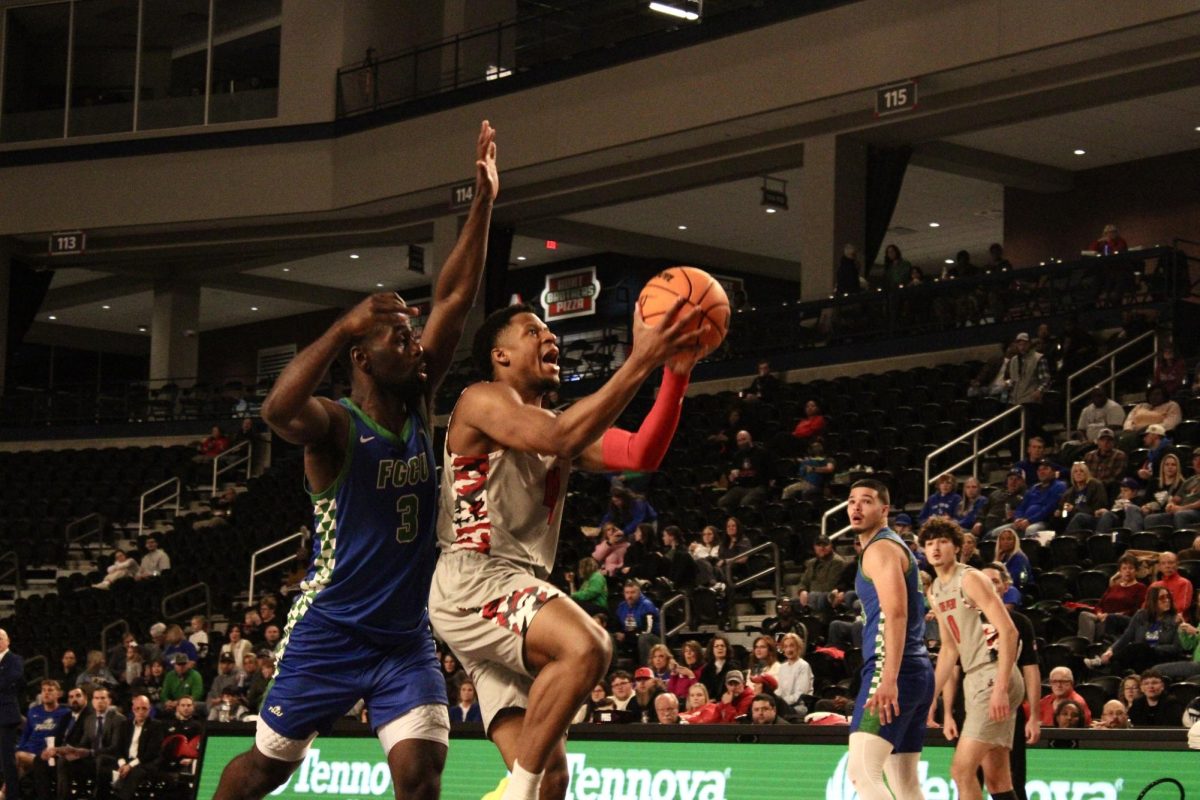 Austin Peay State University junior guard, LJ Thomas, shot a layup in Thursday night's game where the men's basketball team beat Florida Gulf Coast 73-60 at F&M Bank Arena.