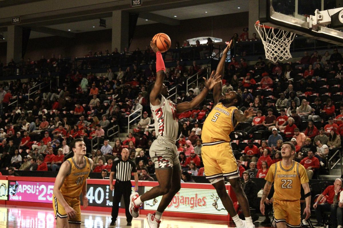 Austin Peay State University senior guard Darius Dawson took a layup in Monday night's game, where the men's basketball team lost to Lipscomb University 95-78 at F&M Bank Arena.