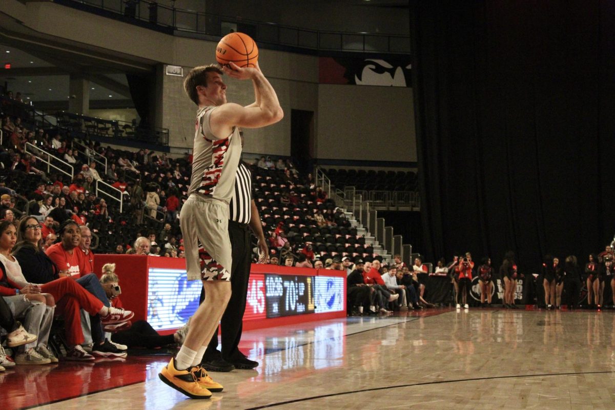 Austin Peay State University senior guard Isaac Haney shot a three in Monday night's game, where the men's basketball team lost to Lipscomb University 95-78 at F&M Bank Arena.