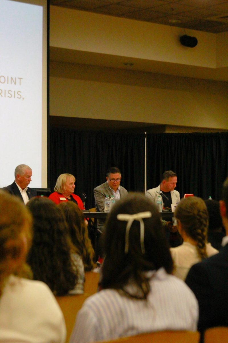 Panelists read and respond to questions from students during the PoliTalk event at Austin Peay State University’s Morgan University Ballroom in Clarksville, Tenn., on Sept. 9, 2025