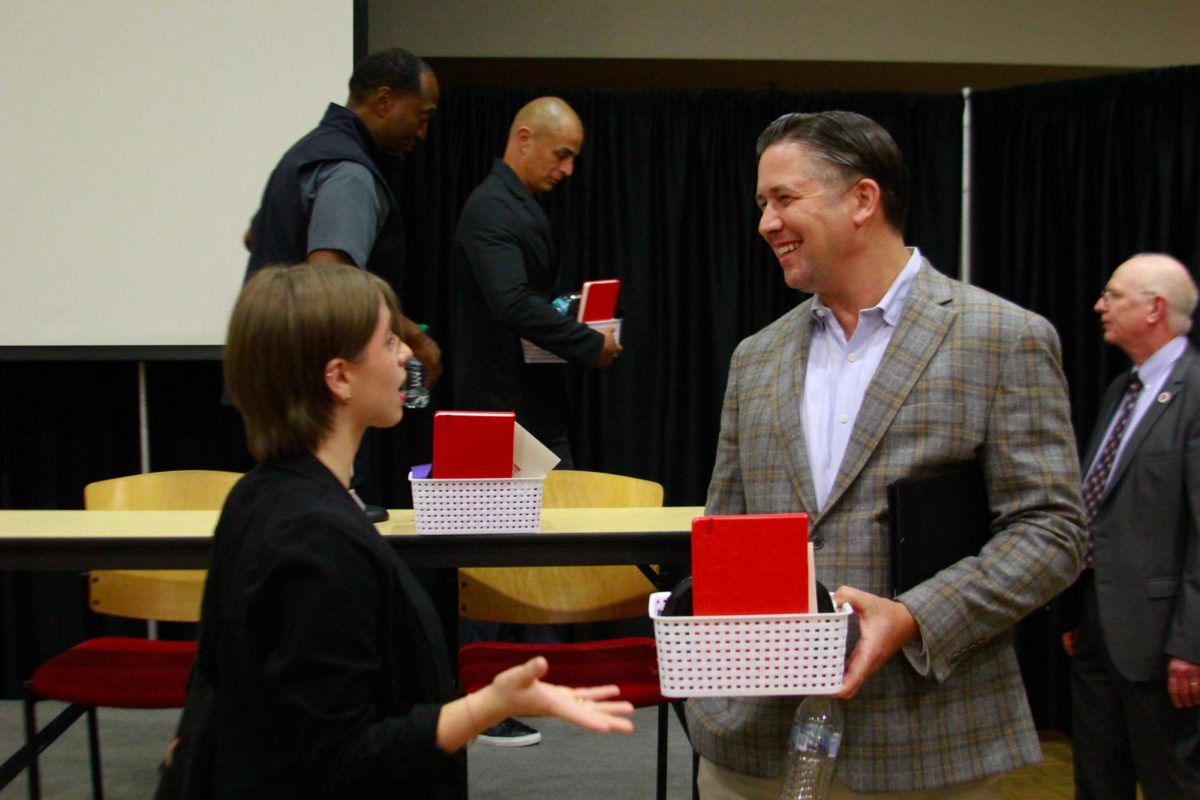 Montgomery County Mayor Wes Golden speaks with a student following the PoliTalk event at the Morgan University Ballroom at Austin Peay State University in Clarksville, Tenn., on Sept. 9, 2025.