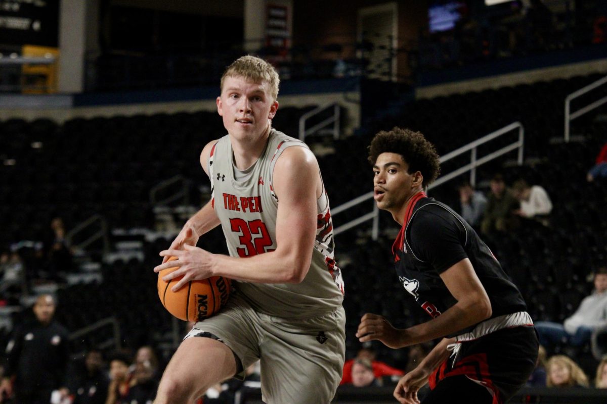 Austin Peay State University graduate forward, Collin Parker, drives in to a clear basket for an easy layup in a 77-59 win over Northern Illinois University, Tuesday night, Nov. 25, 2025.