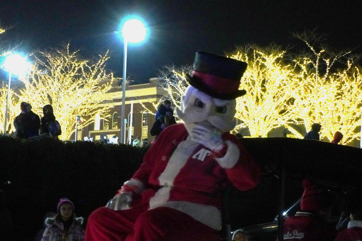 The Governor greeting spectators at the 2025 Clarksville Christmas Parade.