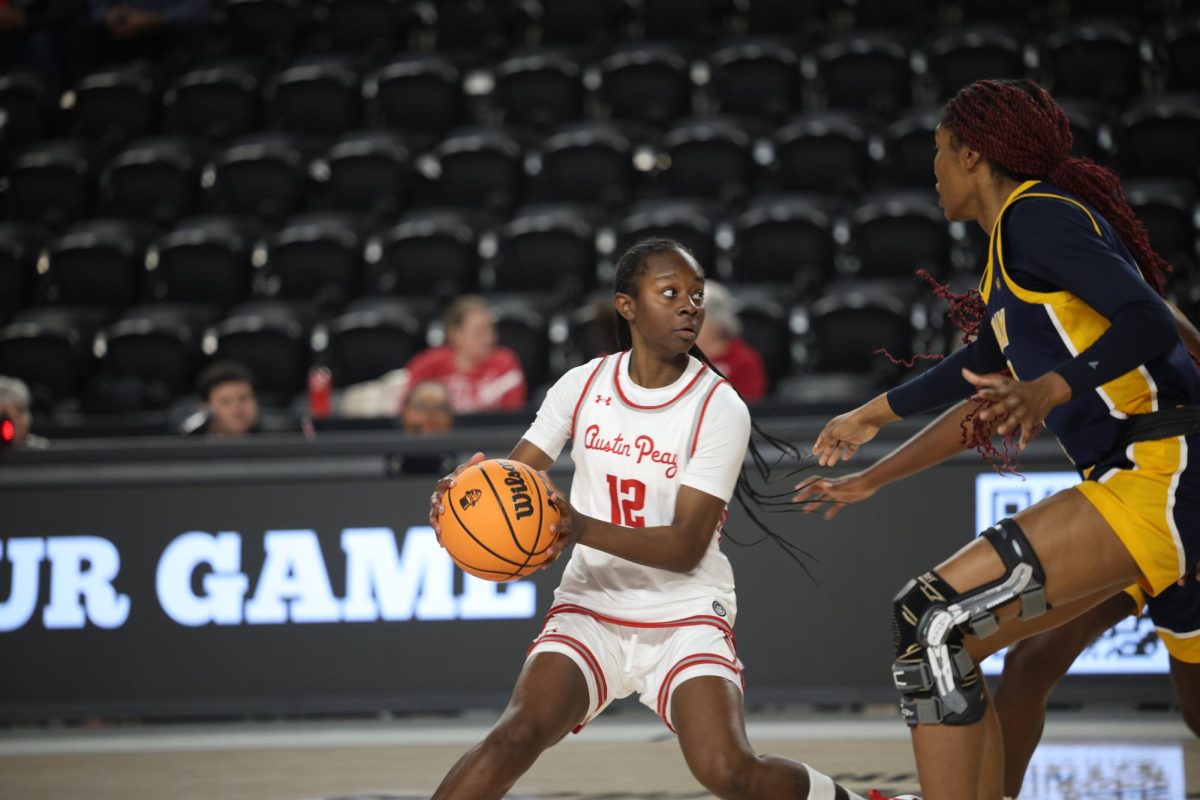 The Austin Peay State University Women's basketball Freshman Jim'Miyah Branton is trying to find an opening as the Lady Govs suffered a tough loss to Murray State, 74-56, at F&M Bank Arena on December 6, 2025.  
