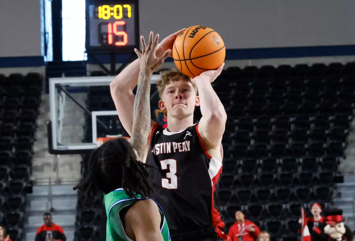 Austin Peay guard Matt Enright shoots over a defender during the Governors’ game against Florida Gulf Coast on Thursday at F&M Bank Arena.