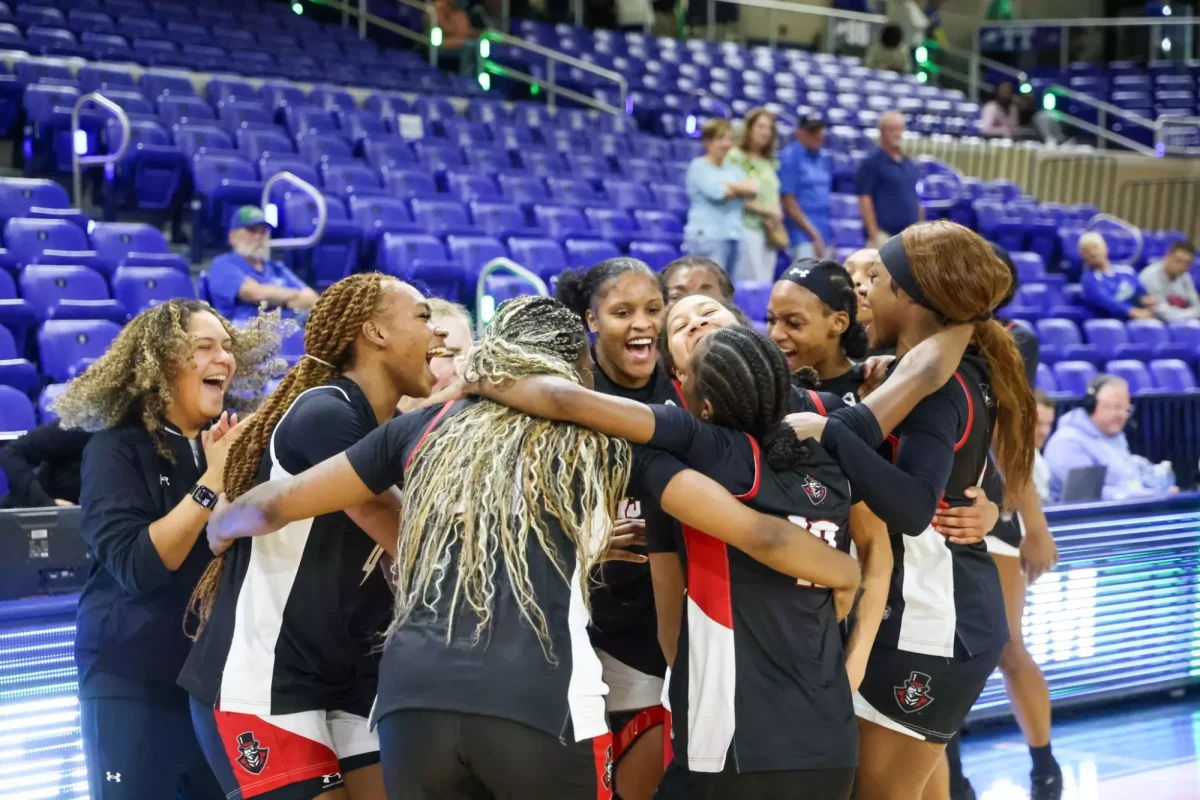 Austin Peay women’s basketball players celebrate after defeating Florida Gulf Coast 74–66 on Thursday at Alico Arena in Fort Myers, Florida.