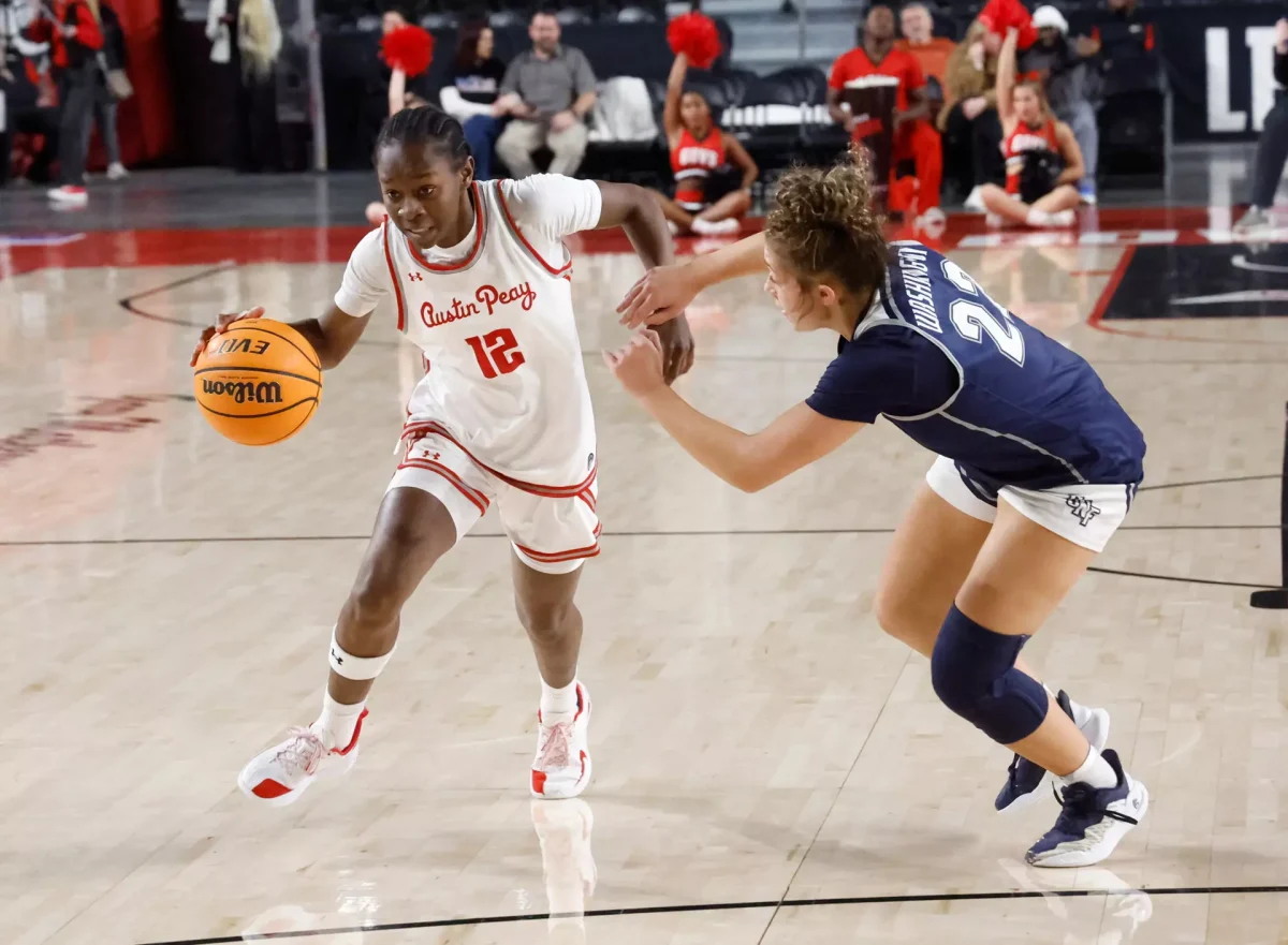 Austin Peay guard Jim’Miyah Branton drives past a North Florida defender during the Governors’ 69-66 loss on Thursday, Jan. 29, 2026, at F&M Bank Arena in Clarksville, Tennessee.