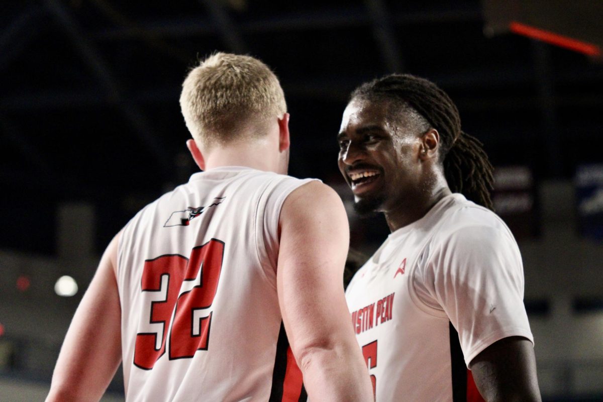 Austin Peay State University junior forward, Rashaud Marshall, cracks a smile after grad student forward Collin Parker got the and one in an 87-76 win over Lipscomb University, Wednesday night, Feb.4, 2026.