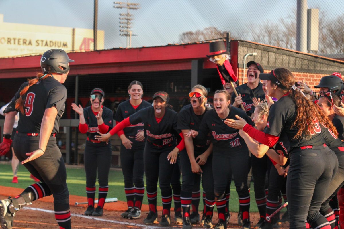 Austin Peay State University players celebrate at home plate after senior infielder Sammie Shelander hits a home run in an 8-7 win against Ohio, Saturday evening, Feb. 28, 2026, at Cathi Maynard Park.