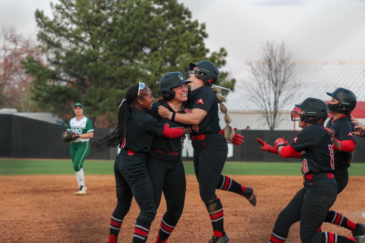 Austin Peay State University players hug freshman infielder Jade Castillo after her walk-off RBI in an 8-7 win against Ohio, Saturday evening, Feb. 28, 2026, at Cathi Maynard Park.