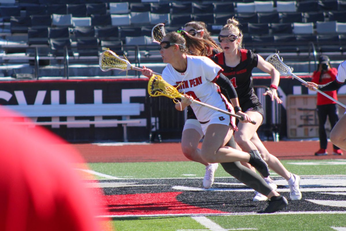 Lauryn Warfield carries the ball downfield during Austin Peay's 15-14 win against Gardner-Webb on Saturday, Feb. 7, 2026.
