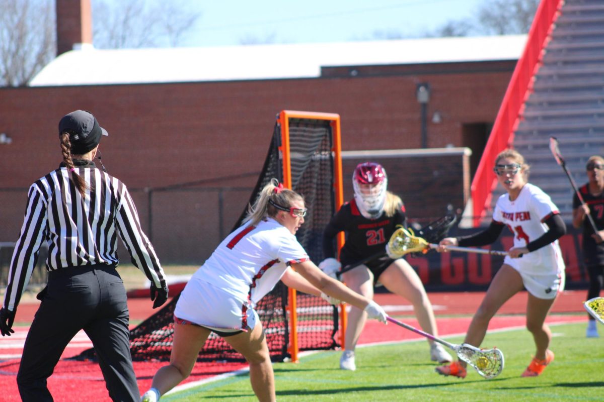 Mak Patten passes the ball to her teammate Fiona Lemke during Austin Peay's 15-14 win against Gardner-Webb on Saturday, Feb. 7, 2026.