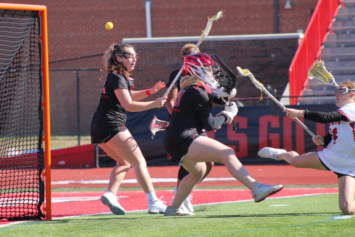 Samantha Houttekier dives onto her knees to score a goal during Austin Peay's 15-14 win against Gardner-Webb on Saturday, Feb. 7, 2026.