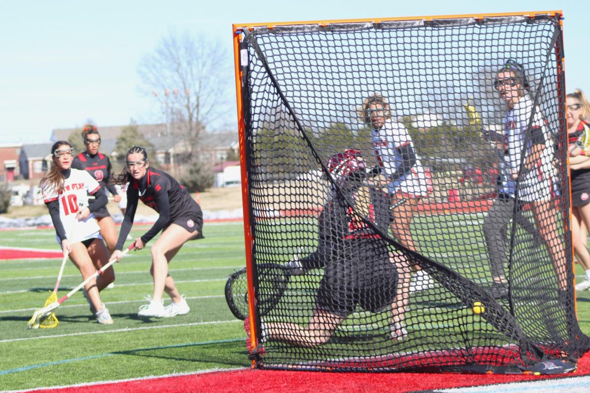 Sophia Schwab scores a goal despite heavy resistance from a Gardner Webb defender during Austin Peay's 15-14 win against Gardner-Webb on Saturday, Feb. 7, 2026.