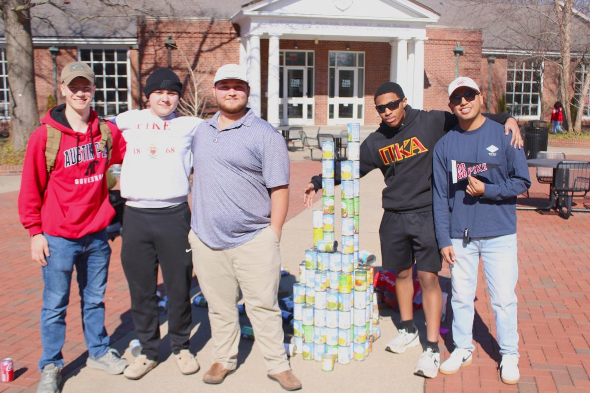 Pi Kappa Alpha winning second place during the Tower of Cans event on Friday, Feb. 13.
