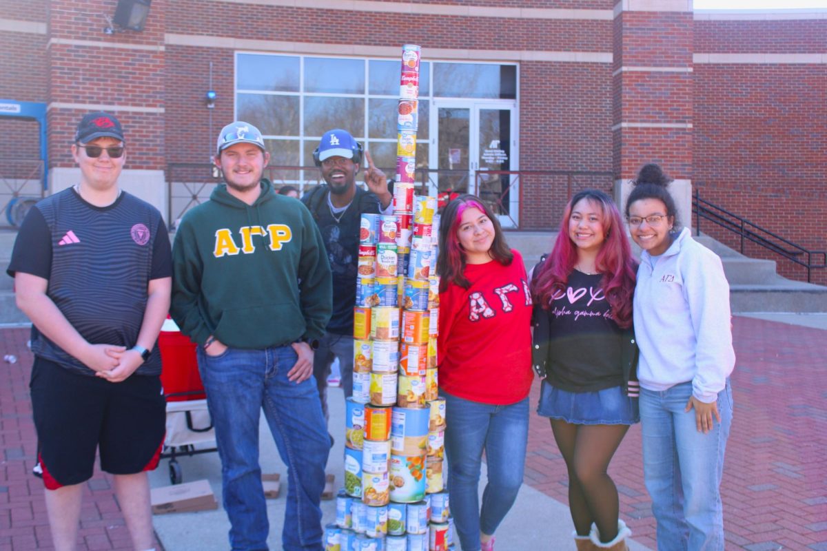 Alpha Gamma Delta and Alpha Gamma Rho winning first place during the Tower of Cans event on Friday, Feb. 13.