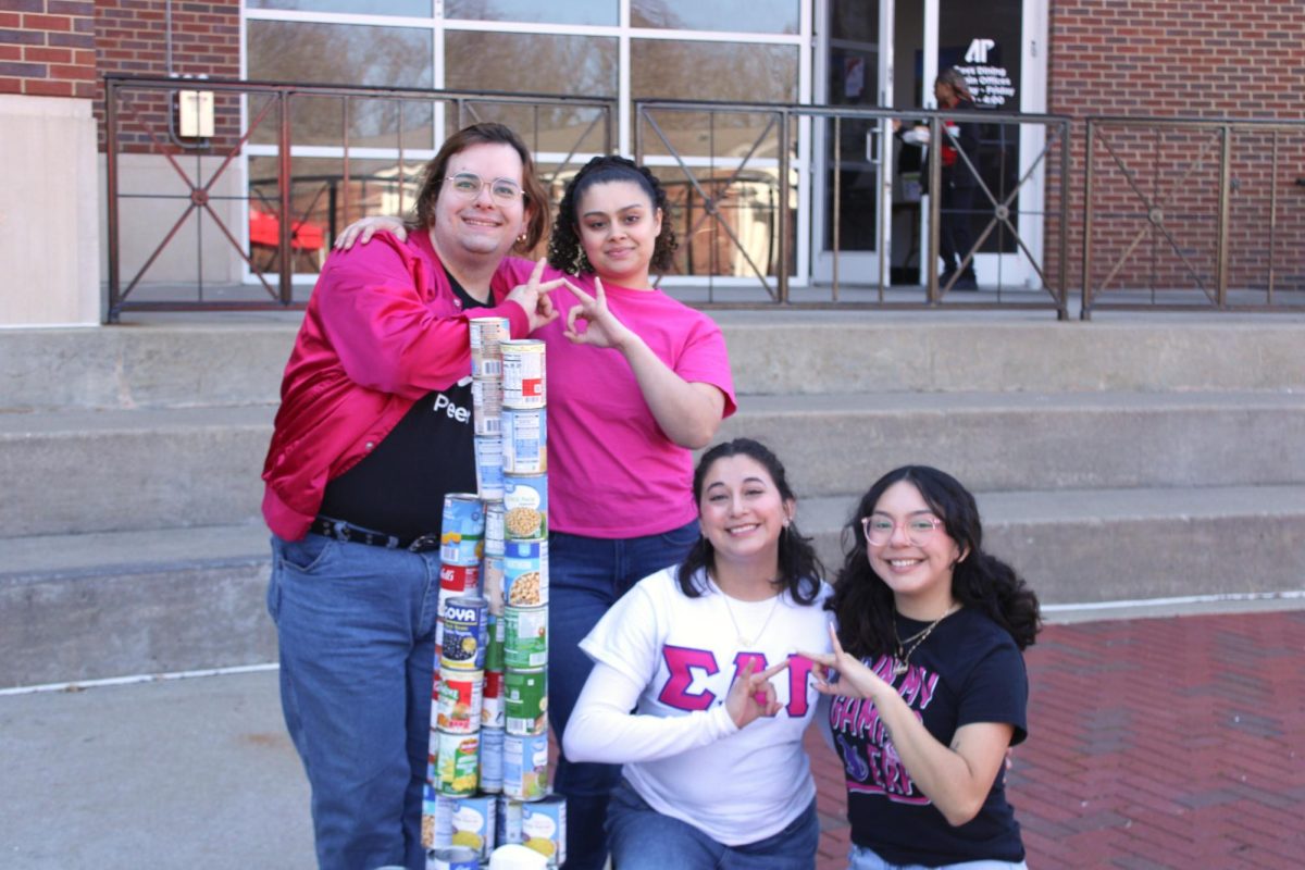 Sigma Lambda Gamma winning third place during the Tower of Cans event on Friday, Feb. 13.
