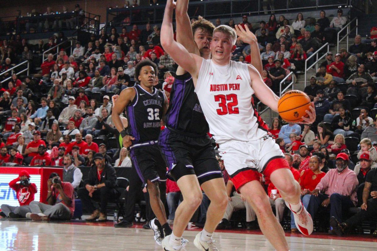 Collin Parker fights past a Central Arkansas defender in Austin Peay's 93-88 loss to Central Arkansas on Feb. 25, 2026.