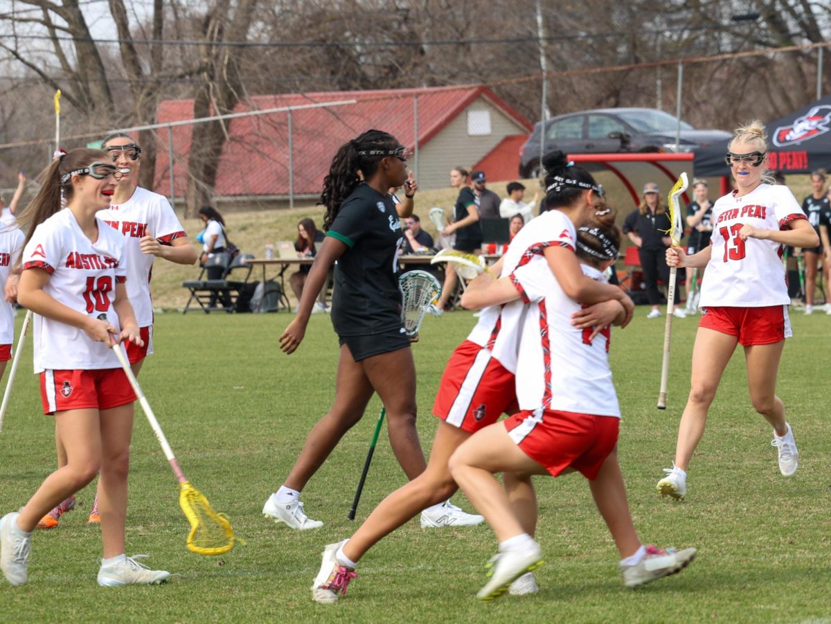Austin Peay State University women’s lacrosse players celebrate after scoring as the Governors fell to Eastern Michigan, 13-10, on March 1, 2026, at Morgan Bros Field.
