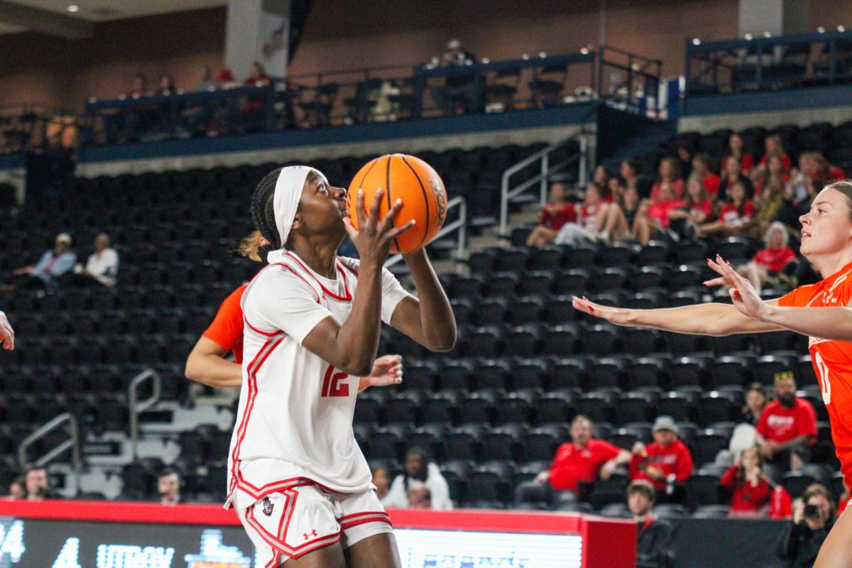 Austin Peay freshman guard Jim'Miyah Branton uses a ball fake before driving in for a layup during a 71-59 loss to the University of Texas Rio Grande Valley on March 19, 2026.