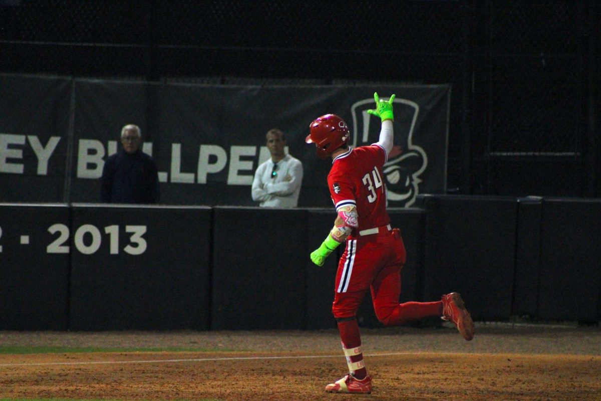 Austin Peay State University redshirt sophomore Cole Johnson celebrates while rounding the bases after his grand slam during an 11-8 loss to Lipscomb University on Friday, March 20, at Raymond C. Hand Park. 
