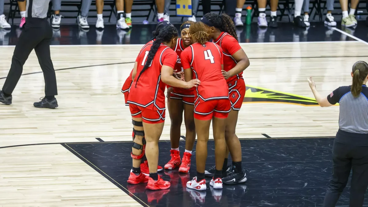 Austin Peay players huddle during the ASUN Tournament championship against the Jacksonville Dolphins on March 9 at VyStar Veterans Memorial Arena. The Governors forced overtime but ultimately fell 66-63.