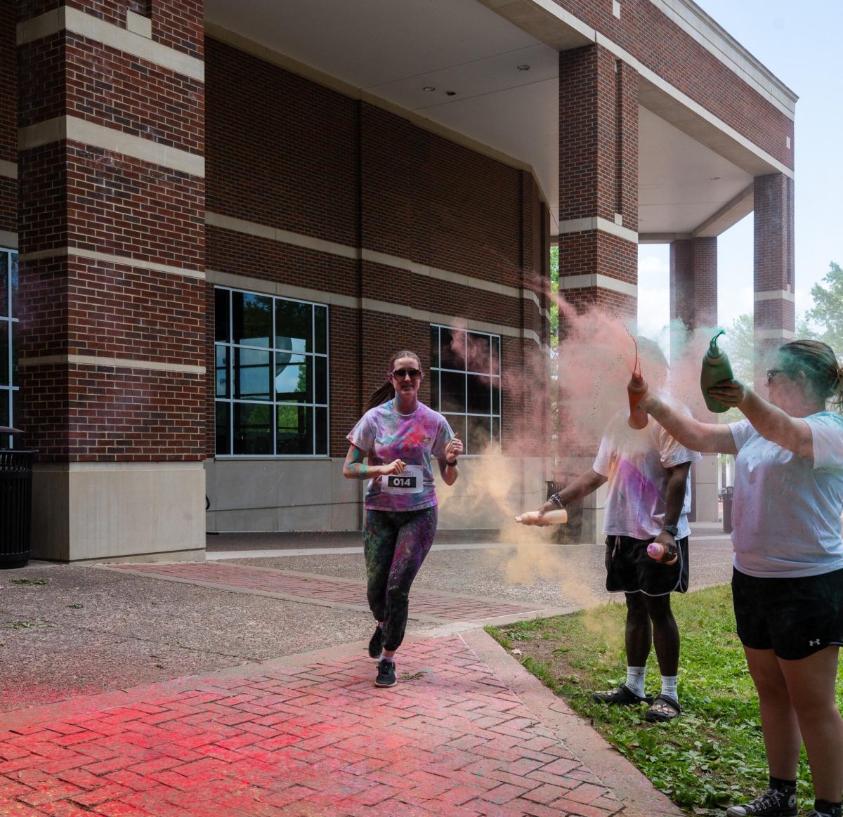APSU student participates in the annual Color Run Sunday, April 19, on Austin Peay's campus hosted by APSU Student Life and Engagement.