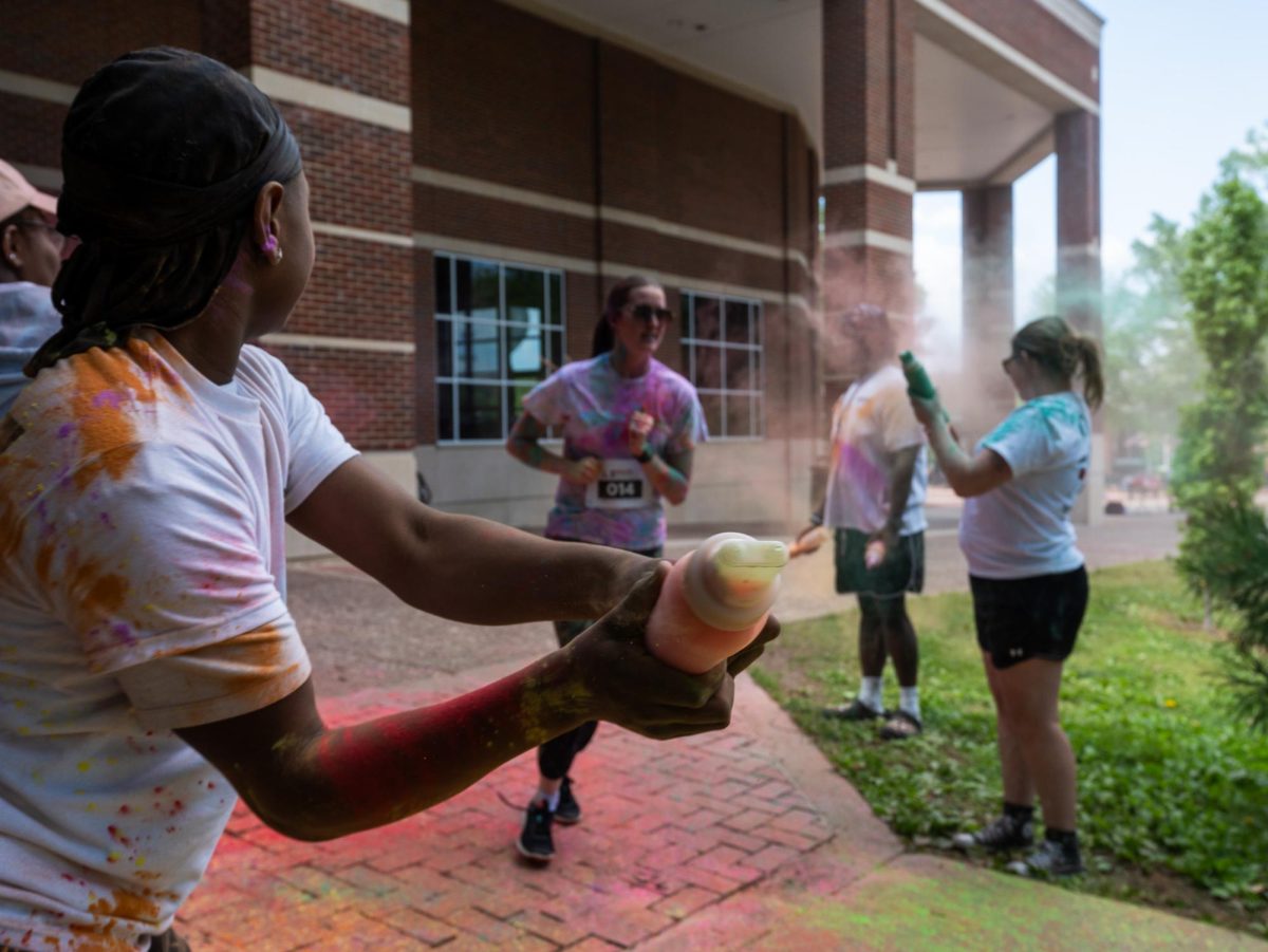 APSU student participates in the annual Color Run Sunday, April 19, on Austin Peay's campus hosted by APSU Student Life and Engagement.