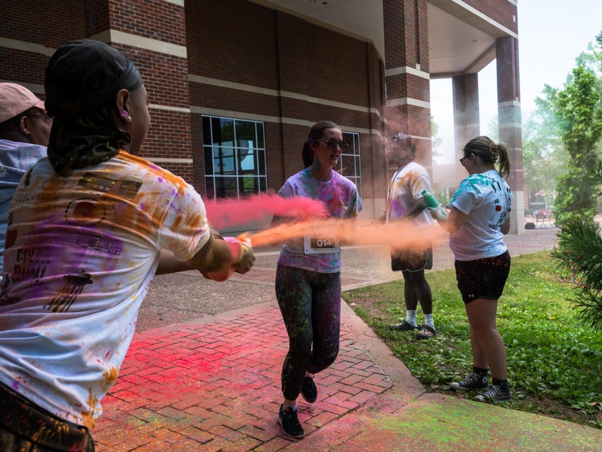 APSU student participates in the annual Color Run Sunday, April 19, on Austin Peay's campus hosted by APSU Student Life and Engagement.