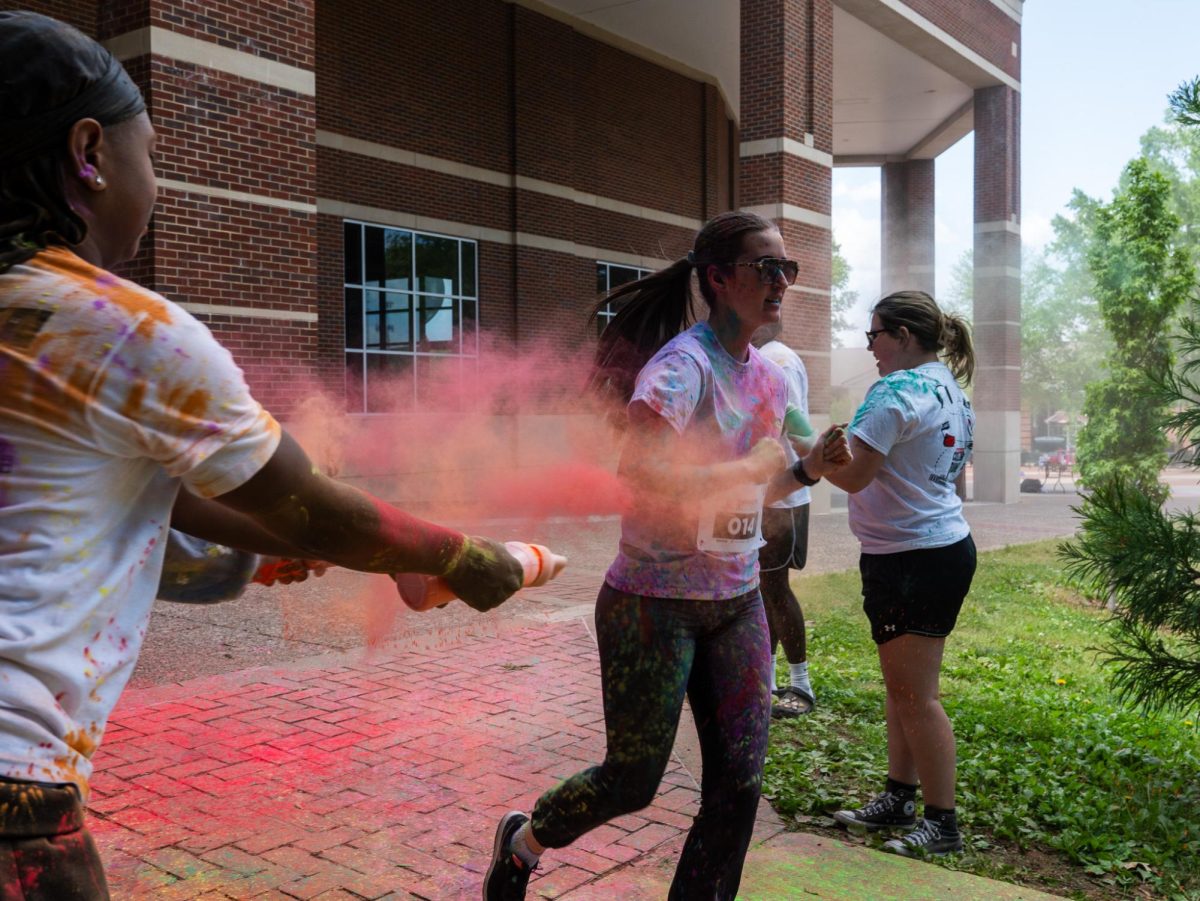 APSU student participates in the annual Color Run Sunday, April 19, on Austin Peay's campus hosted by APSU Student Life and Engagement.