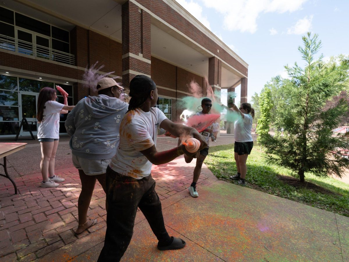 APSU student participates in the annual Color Run Sunday, April 19, on Austin Peay's campus hosted by APSU Student Life and Engagement.