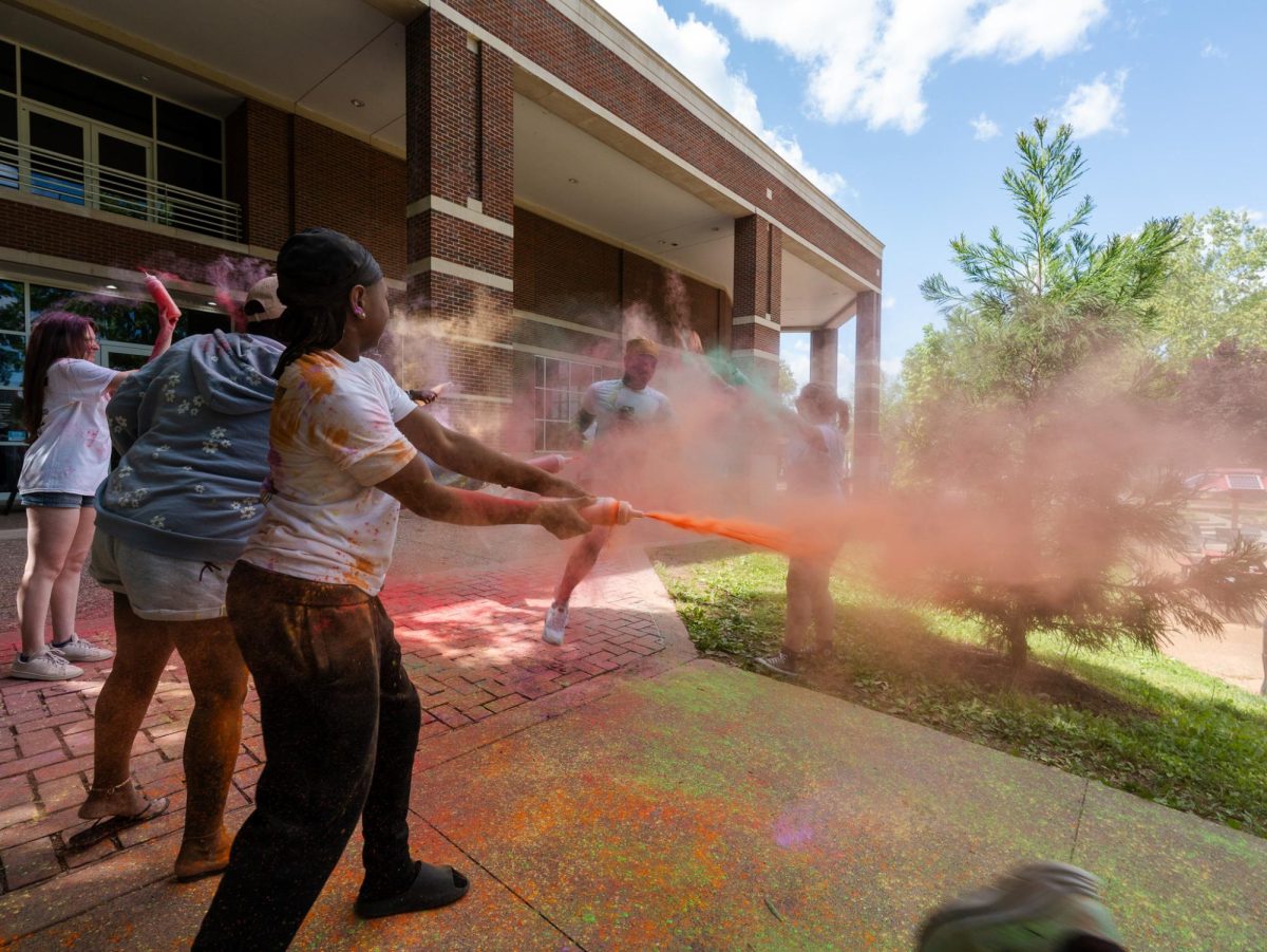 APSU student participates in the annual Color Run Sunday, April 19, on Austin Peay's campus hosted by APSU Student Life and Engagement.