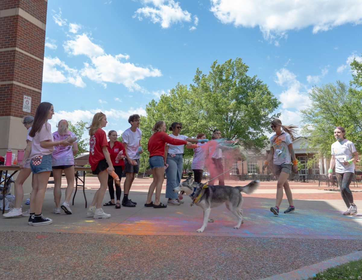 APSU student participates in the annual Color Run Sunday, April 19, on Austin Peay's campus hosted by APSU Student Life and Engagement.